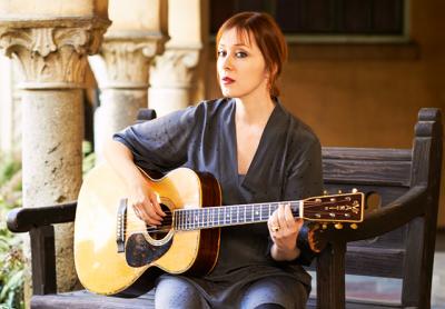 Suzanne Vega will commute to Guild Hall all the way from Amagansett to bring a set of old and new tunes for her concert on Saturday.