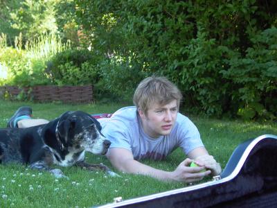 The author's son, Billy Taylor, who makes a mean salad dressing, with their dog Gumbo from earlier days