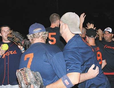 The Fuelmen celebrated after prevailing 9-7 in nine innings last week over the three-time-defending-champion Independent.