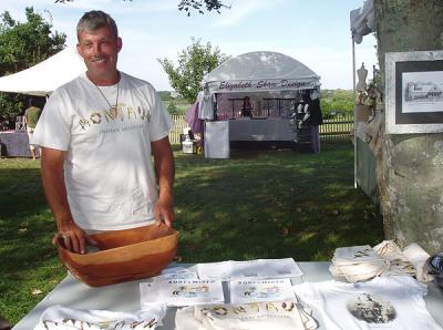 Lawrence Cooke set up his Indian artifacts displays at the Montauk Historical Society’s craft fair last week to drum up interest and collect donations.