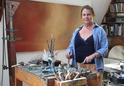 Although she often starts her canvases at the beaches she depicts, Cynthia Knott works in her studio to finish them.