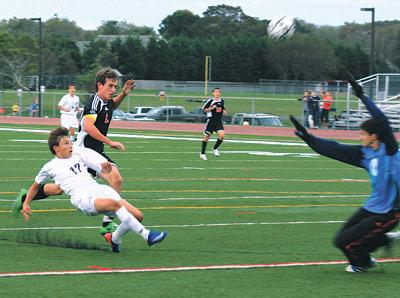 This foul of Esteban Valverde (17) resulted in a penalty kick, which Mario Olaya made near the end of the first half.