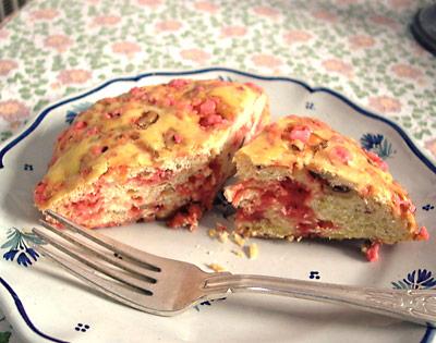 One specialty shop sold nothing but amusing cakes made of brioche dough into which crushed hot pink pralined almonds have been folded and baked.