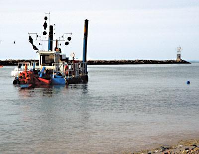 The operation of a dredge by the North American Landscaping, Construction, and Dredge Company was the focus of a heated discussion at the Montauk Coast Guard station on Monday.