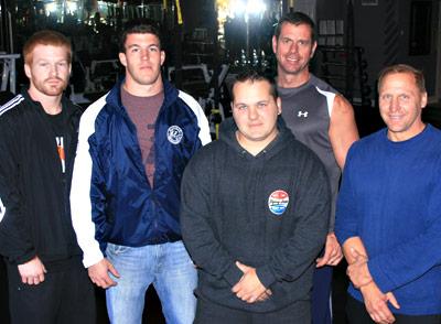 Among the trainers who are excited to be part of a turnaround are, from left, Avery Crocker, Connor Miller, and Mike Roesch, who were at Studio 89 the other day with the owner, Rich Decker (behind Roesch) and Gary Stanis.