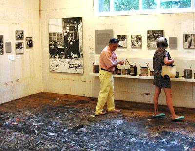 A centennial celebration of Jackson Pollock in Nagoya, Japan, features a recreation of his Springs studio, including the paint-strewn floor, paint cans, and brushes.