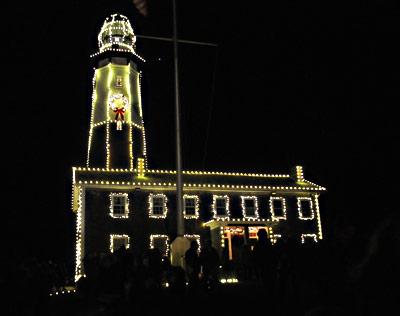 Msgr. Peter Anthony Libasci had the honor of flipping the switch that ignited 3,777 lights on the Montauk Lighthouse.