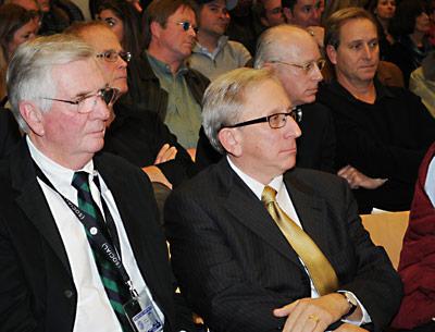 The crowd last Thursday included, from left, Jim Brundige, the airport manager, and Peter Kirsch, an attorney specializing in airport matters.