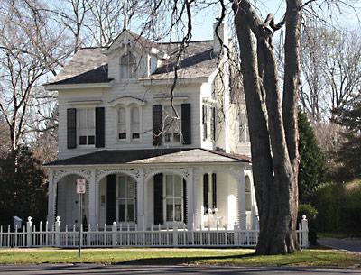 The 1872 Italianate-style James Arrowsmith house may be known as the Gingerbread House, but the fretwork on its porch was actually added later.