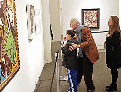 Ron Delsener took in a painting with his daughter and grandson at Sotheby’s on Dec. 13.