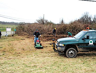 State park workers joined with town employees and members of the East Hampton Trails Preservation Society this week to repair old trails and blaze new ones at the Amsterdam Beach Preserve in Montauk.