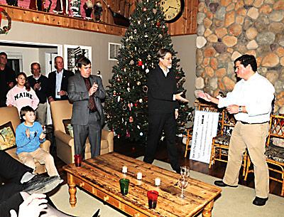 The Rev. Steven E. Howarth of the Amagansett Presbyterian Church accepted a check for $8,729 from Tim Walters, master of the Star of the East Lodge No. 843, at its annual Toys for Tots Christmas party, to help rebuild Scoville Hall, which was destroyed in a fire.