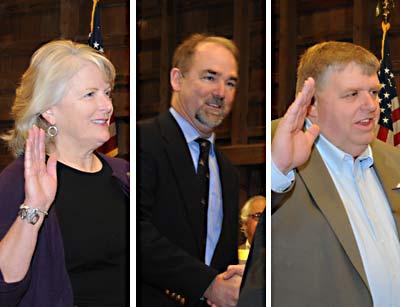 East Hampton Town Councilwoman Sylvia Overby, left, and her Democratic running mate, Peter Van Scoyoc, center, the two top vote-getters in the recent board election, were sworn in at Town Hall on Tuesday, as was Stephen Lynch, right, as highway superintendent.