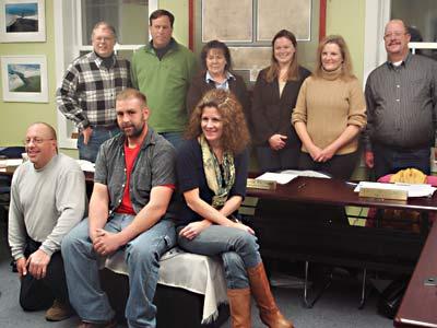 East Hampton Town trustees were sworn in on Tuesday night. From left back row and clockwise, Tim Bock, Sean McCaffrey, Diane McNally, Stephanie Talmage, Lynn Mendelman, Joe Bloecker, Deborah Klughers, Nat Miller, and Stephen Lester.