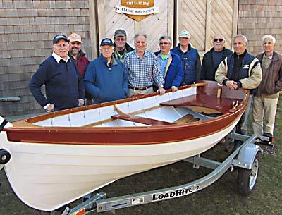 Jonathan Russo of Shelter Island (in plaid) was the winner of the East End Classic Boat Society’s 2011 fund-raising raffle. His prize was a Sunshine tender and trailer made by the group’s members, some of whom were on hand Saturday when Mr. Russo came to get the boat.