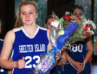 Kelsey McGayhey’s first basket in Friday’s game at the Ross School was notable for the fact that, with it, she became the first Shelter Island High School female to reach the 1,000-point plateau. 	Kelsey McGayhey’s first basket in Friday’s game at the Ross School was notable for the fact that, with it, she became the first Shelter Island High School female to reach the 1,000-point plateau.