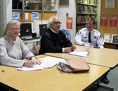 Councilman Dominick Stanzione, center, is the new liaison from the East Hampton Town Board to the Montauk Citizens Advisory Committee. He attended its Monday meeting with Lt. Christopher M. Hatch, the new Montauk precinct commander, right, and the committee’s chairwoman, Lisa Grenci.