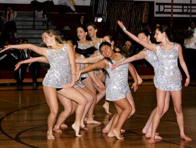 East Hampton High’s dance company assuaged some of the pain of the 60-32 boys basketball loss here Saturday to undefeated Amityville.