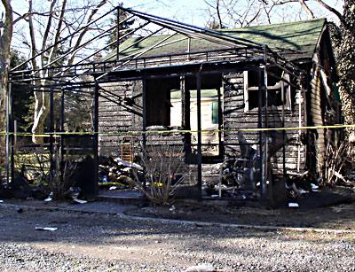 The shell of Cabin 11 at the Cozy Cabins complex in Wainscott in which William Bauer, 78, died in a ball of fire Friday