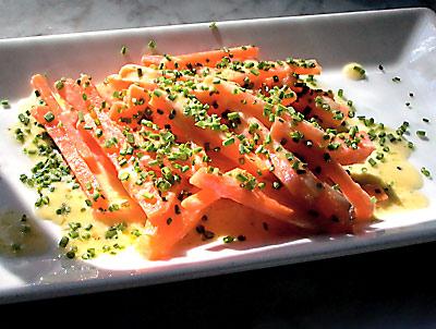 Try the carrots blanched, then sautéed with a bit of butter and topped with minced chives.