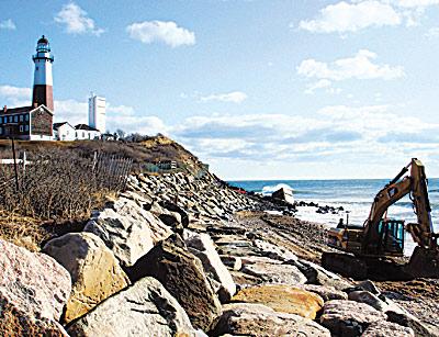 The Montauk Point Lighthouse was placed on the list of National Landmarks this week while the work got under way on the stone revetment that protects the bluff it rests on.