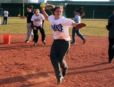 East Hampton’s athletes have been at play in the fields of Bonac. Clockwise from upper right, Kevin Brophy, during Friday’s baseball practice, checked out Cameron Yusko’s delivery, Michelle Kennedy’s charges unleashed serves, Allison Charde, the girls lacrosse team’s goalie, came under attack, and Ali Harned,  who is slated to be the varsity’s shortstop, prepared to gun out a runner. 	Jack Graves Photos