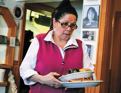 Cristina Albranda has worked at Mr. John’s Pancake House in Montauk for over 30 years.