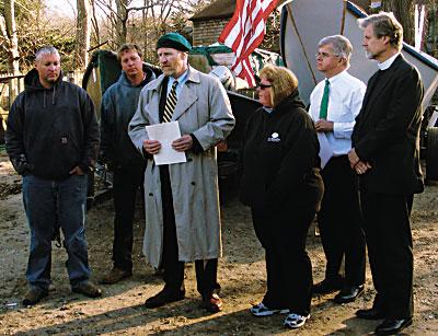 Daniel G. Rogers, center, announced his request that Gov. Andrew Cuomo investigate the D.E.C.’s enforcement policy during a press conference in East Hampton on Monday afternoon.