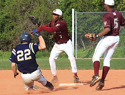 Deilyn Guzman, about to tag out a Bayport-Blue Point runner in the early going of Monday’s 6-0 loss here, was the winning pitcher in the third game of the Shoreham series.