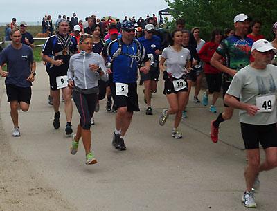 The half-marathon’s competitors soon were off the road and into the woods.