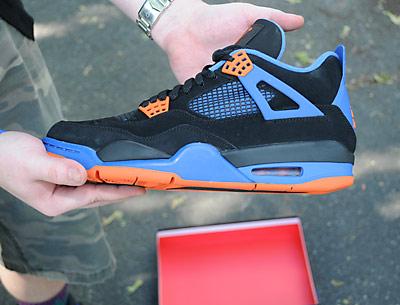 Eighteen pairs of a coveted Retro Jordan 4 had people lining up all night in advance of Sneakerology’s Saturday store hours.