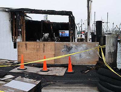 A fire destroyed the packing house at the Montauk Fish Dock early Friday morning. It will be rebuilt.