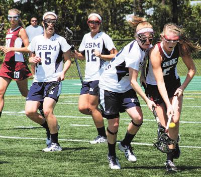 Carley Seekamp, at right, and her East Hampton teammates were closely marked by their Eastport-South Manor peers. Nothing came easy.