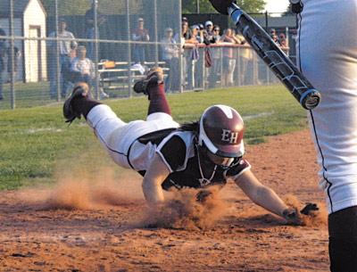 Deryn Hahn, airborne above, scored East Hampton’s second run, having been doubled home by Kathryn Hess in the sixth inning.