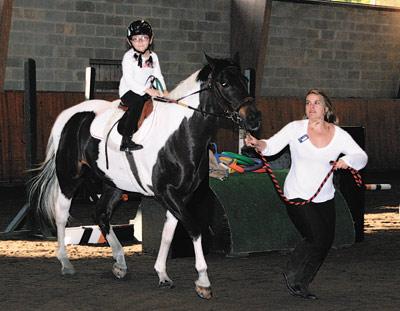 Hope Hamilton, 8, trotted on Kirolak, led by Jessie Bihlmaier.