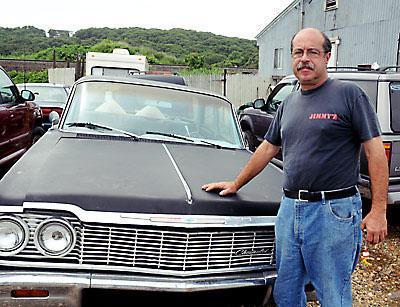 Tom Ferreira, outside his house on Navy Road in July of 2010.