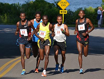 On the way toward the home stretch, the lead pack included Simon Ndirangu, who was to win, Boniface Biwott, Tesfaye Girma, who was to be the runner-up, and Samuel Ndereba, who was to place third.