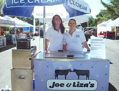 Liza Tremblay, right, co-owner of Joe and Liza’s Ice Cream of Sag Harbor, made in Sag Harbor, with her assistant Claire Timmons, left, at the East Hampton Farmers Market