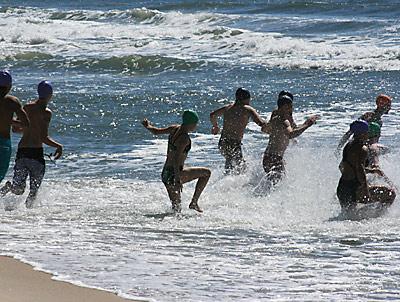 The surf wasn’t rough, but the water was cold, and the low tide lengthened carries up the beach.