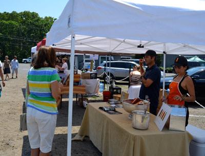 Local farmers and food purveyors began setting up outdoor stands in the parking lot at Whole Foods in Wainscott last week, shielded from the sun by makeshift tents.