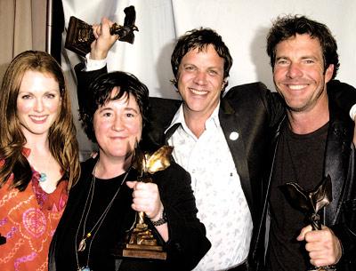 Julianne Moore, Christine Vachon, Todd Haynes, and Dennis Quaid, from left, posed with their Independent Spirit Awards for the film “Far From Heaven” in 2003.