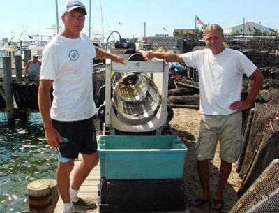 Mike Martinsen, left, and Mike Doall, are the “two Mikes” behind the Montauk Shellfish Company’s oyster farm in Lake Montauk.