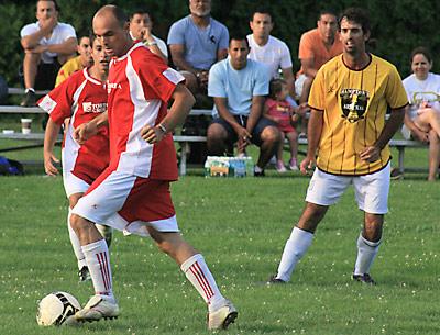 Rene Gutierrez, with the ball above, preserved Tortorella’s 2-1 upset of 75 Main near the end of the first of July 25’s semifinal matchups.