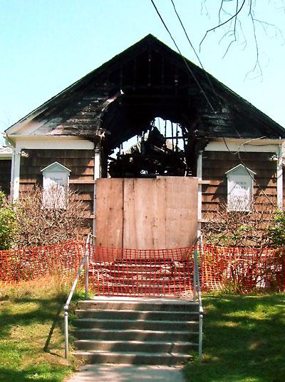 Ten months after it was destroyed by fire, reconstruction of the Amagansett Presbyterian Church’s Scoville Hall is at least several more months away.