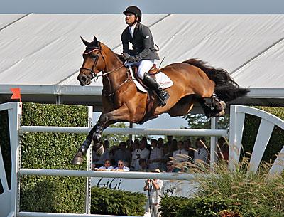 Head up: Kent Farrington and Voyeur, who evidently would rather go for it than look on, were the only pair among the three horse-and-rider combinations in the jumpoff to go clean.