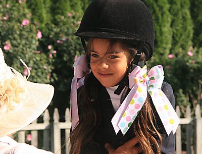 J.T. Sheeler, 6, talked it over with Stony Hill’s trainer, Chrissy Clark, before entering the leadline ring