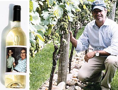 An old family photo, left, of Michael Cinque, age 4, and his grandfather makes an ideal label for his homemade wine called Mi Famiglia. Right, Mr. Cinque shows off the mini-vineyard at his Amagansett house.