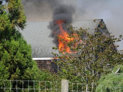 The roof and second floor of this Long Lane barn were destroyed by an electrical fire last Thursday afternoon.