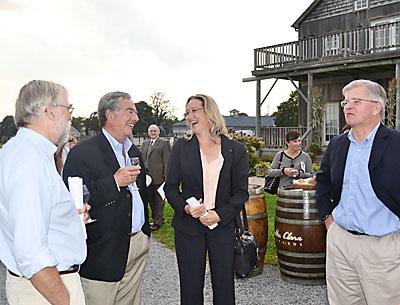 Bridget Fleming, center, said that it was a pleasure to work with Myron Levine, left, and Assemblyman Fred W. Thiele Jr., right, on the launch of a new nonprofit, All for the East End.