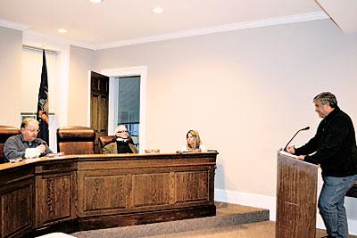 Sag Harbor Mayor Brian Gilbride heard complaints on Tuesday evening from several residents, including Police Chief Tom Fabiano, about closed-door negotiations with other police departments.